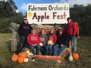 Fuhrmann Orchards (from left) Andrew, Leanne, Abby, Melanie, Paul and Jeremy right before the 2018 Apple Fest 
(All photos in this article courtesy of Leanne Fuhrmann)