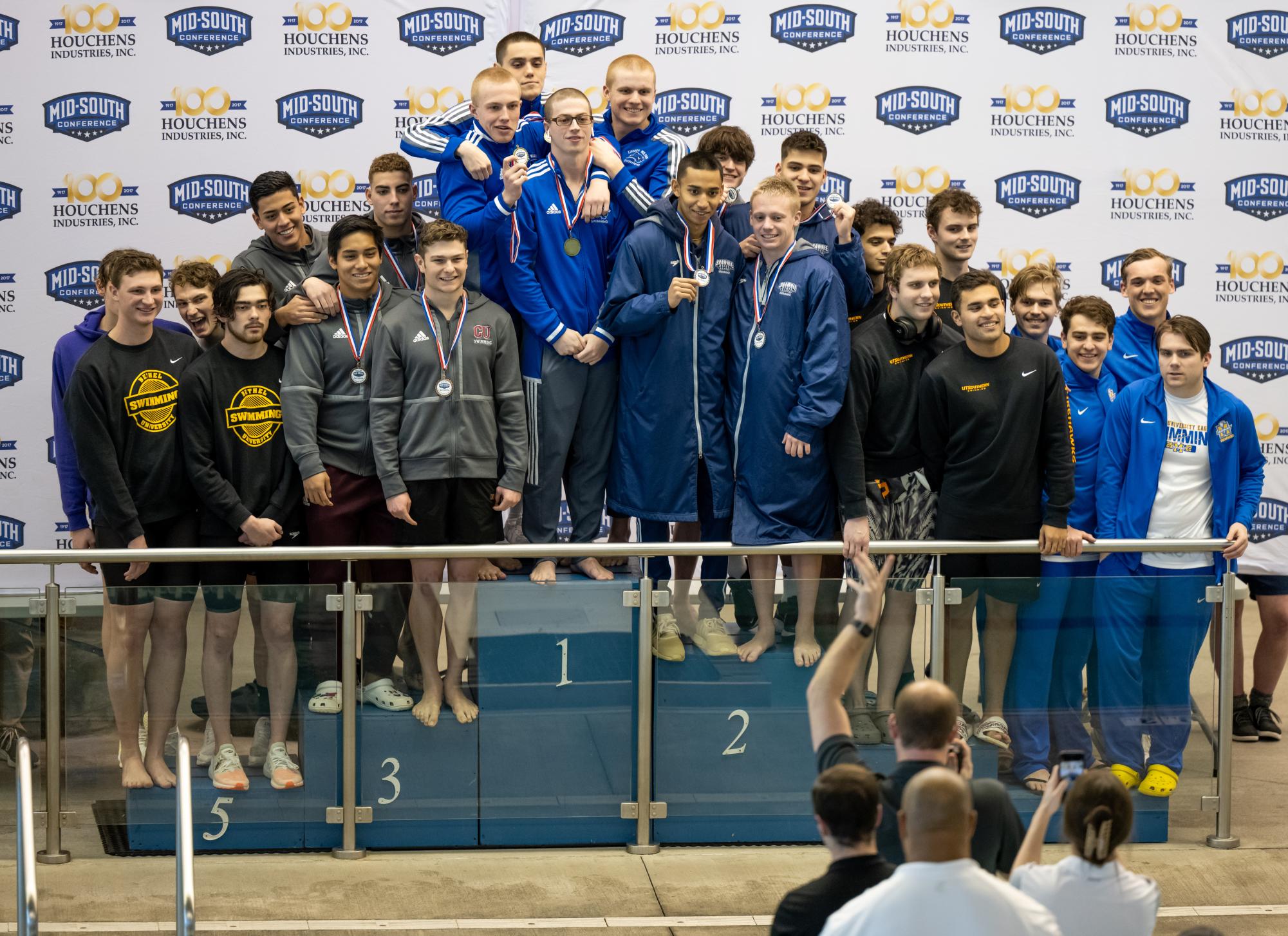 Members of the SSU mens swimming team celebrate their second-place finish in the relay at the 2023 Mid-South Conference Championship.
