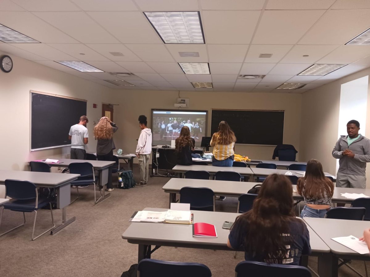 Shawnee State Spanish students learn from previous Shawnee State Spanish students by watching a video of them singing a song about directions. 