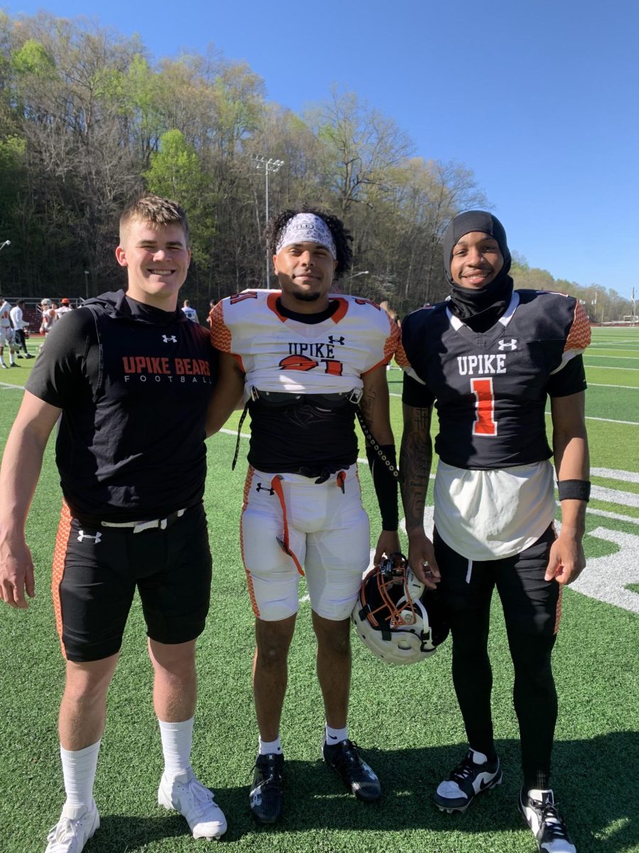 University of Pikeville football players Tayden Carpenter, Dige Savage and Jordan Williams